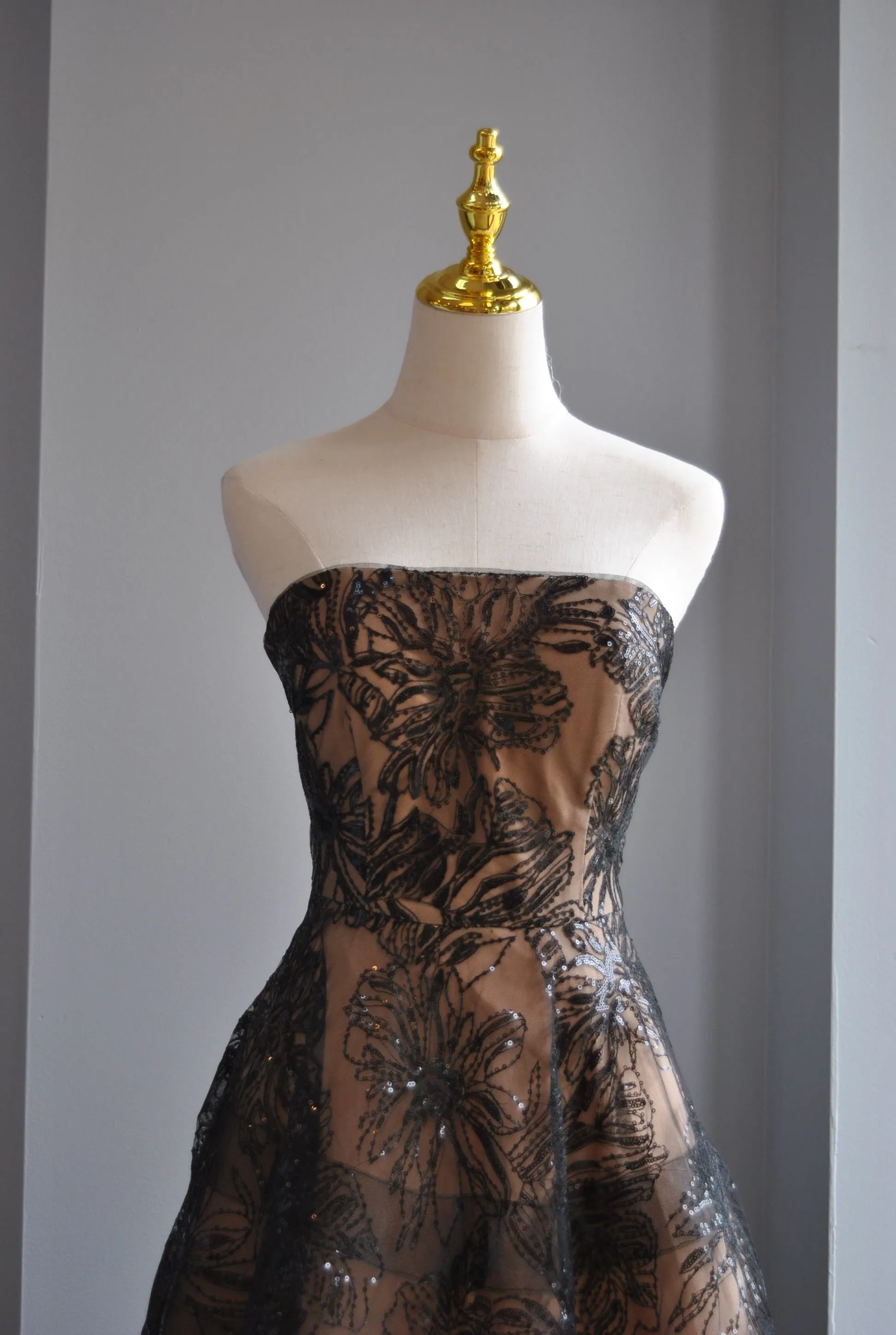 BLACK AND BEIGE SEQUIN MIDI FIT AND FLAIR COCKTAIL DRESS