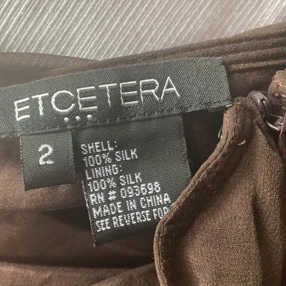 ETCETERA embroidered A-line brown midi skirt in excellent condition