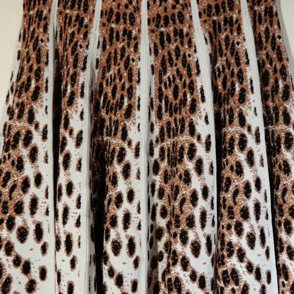 GIANNI BINI Dorinda Pleated Knee SKIRT Size L Leopard Rayon Heavy Knit NEW $129