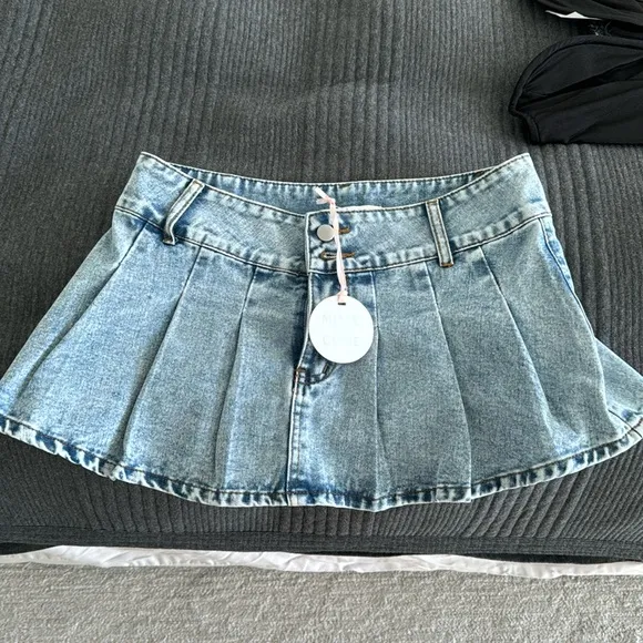 Nika Pleated Mini Skirt in Light Wash size smallMORE TO COME