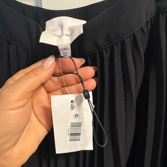 NWT black pleated Cinq A Sept midi skirt size 12