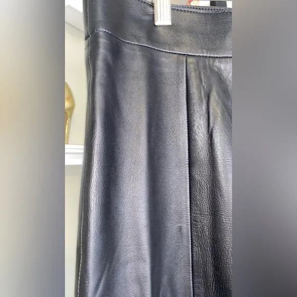 SIGNATURE PLEATED LEATHER SKIRT